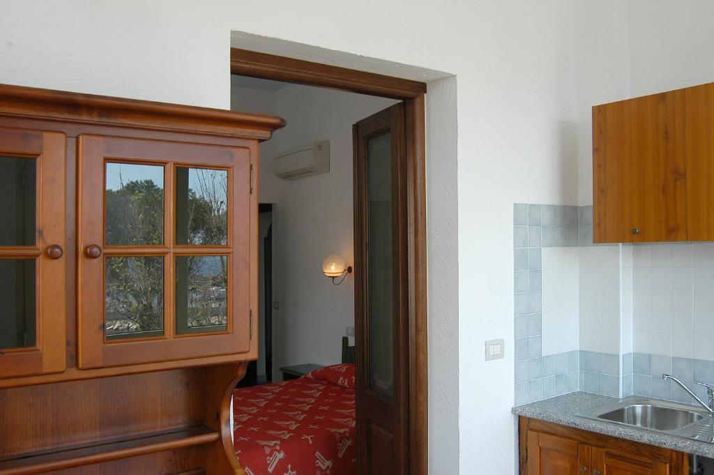 Acacia Appartamenti Cala Gonone Pokoj fotografie